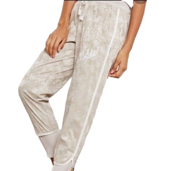 NIKE NSW Jacquard Satin Cuffed Track Pants Cream All Over Print Size XS - Picture 1 of 11
